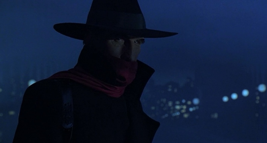 Alec Baldwin as The Shadow, making his first appearance in "The Shadow" (1994)