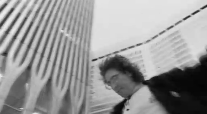 Timothy "Speed" Levitch, spinning between the twin towers in "The Cruise" (1999)