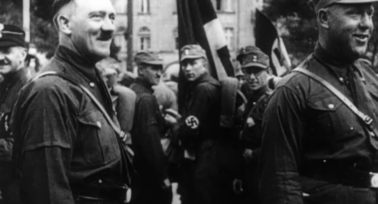 Adolf Hitler and Leonard Zelig (with glasses) in "Zelig" (1983)