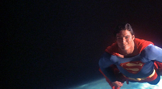 The ending to Superman–The Movie: Superman smiles at camera